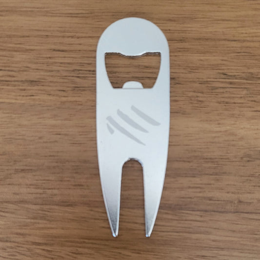 Golf divot tool with bottle opener